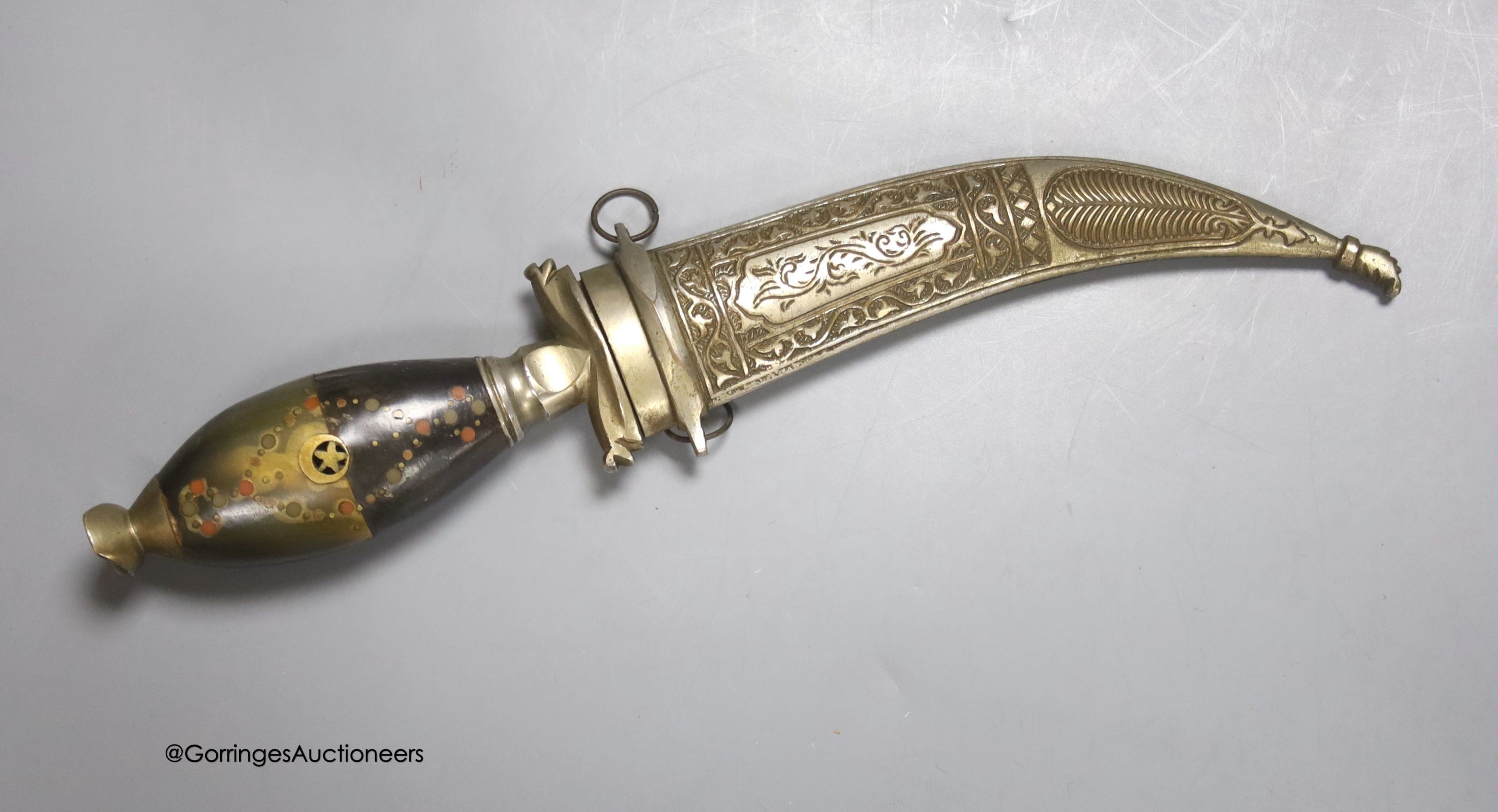 A Middle Eastern dagger, with inlaid horn handle, in sheath